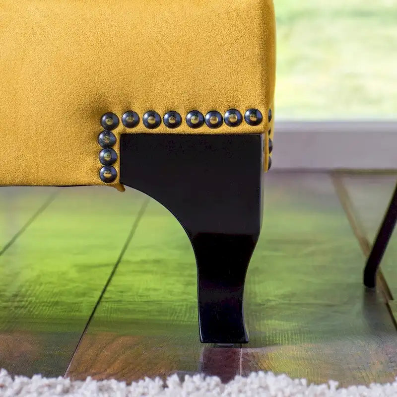 Canapé contemporain en velours avec accoudoirs inclinés