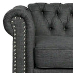Fauteuil Chesterfield capitonné avec rivets décoratifs et pieds en bois massif
