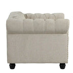 Fauteuil Chesterfield capitonné avec rivets décoratifs et pieds en bois massif