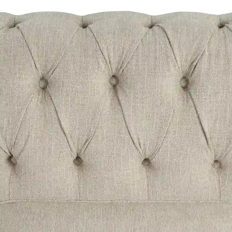 Fauteuil Chesterfield capitonné avec rivets décoratifs et pieds en bois massif