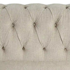 Fauteuil Chesterfield capitonné avec rivets décoratifs et pieds en bois massif